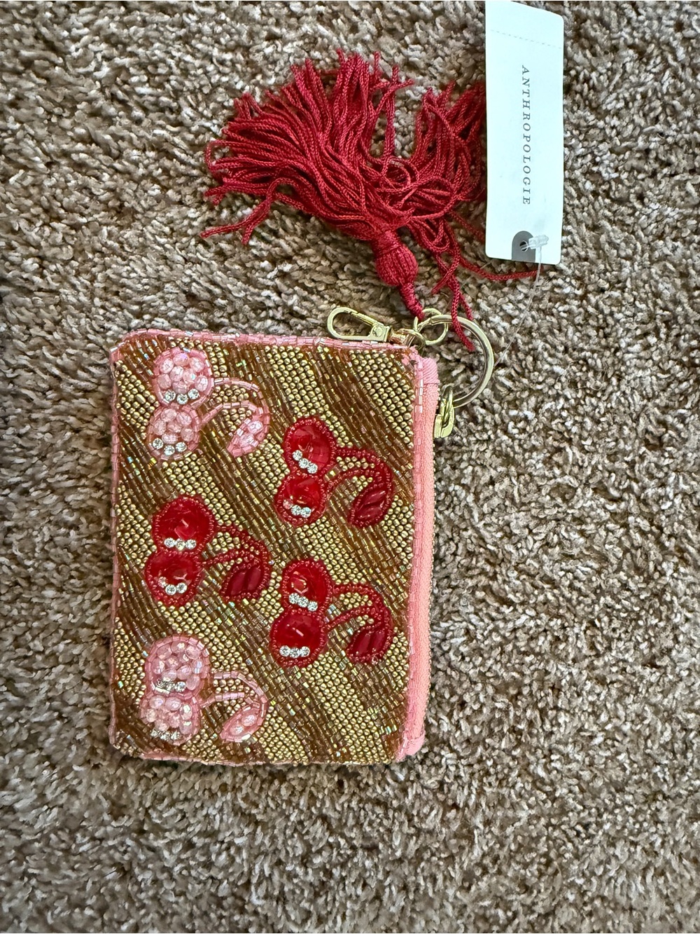 Anthropologie Gold Beaded Cherry Tassel Pouch with Pink Trim